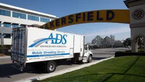 ADS truck going under Bakersfield sign